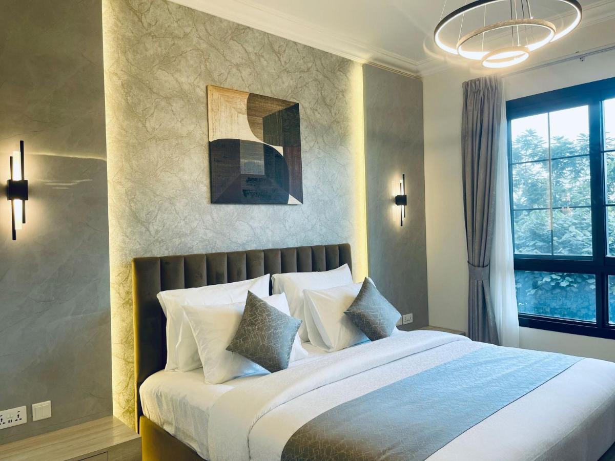 Апартаменти Goodwood Homes Vacation *